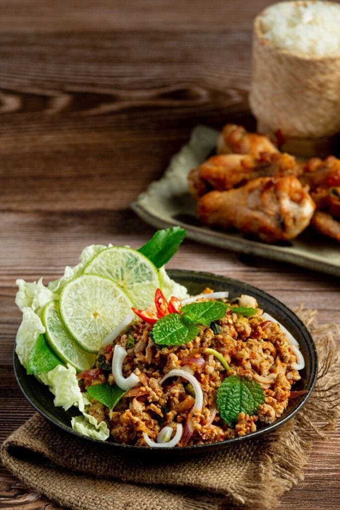 https://img.freepik.com/free-photo/thai-food-with-spicy-minced-pork-serve-with-sticky-rice-fried-chicken_1150-34599.jpg?t=st=1744083969~exp=1744087569~hmac=255c6541a82a137d1ef8785acc8311e1680d3a824c9035d6908723a1ed2a7c6b&w=740